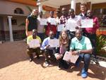 Health care workers holding their certificates of successful participation at the end of an EFFO training in Rwanda (© RKI)